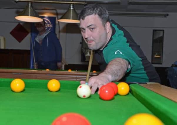 Robert Wilson playing in the pool competition to raise funds for VHL (Von Hippel-Lindau) at the St Comgall's Club. INLT 18-033-PSB