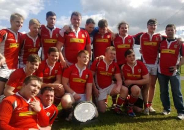 Larne Rugby Club's Under-19s, pictured with the Plate trophy after defeating Malone 18-0.