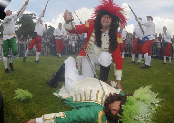 King James II being slain by King Billy. His grandfather founded Londonderry. Two bids for funding to commemorate King James I's Royal Charters of 1613 failed.
