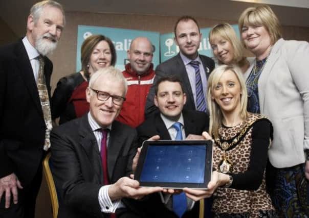 Pictured at the launch of the locali App at Craigavon Civic Centre are back row from left, Paul Kavanagh, economic development officer, Craigavon Borough Council, Theresa Donaldson, Council chief executive, gareth Verner, Portadown Football Club, Councillor Darryn Causby, Nicola Wilson, head of economic development, Craigavon Borough Council, and Geraldine Lawless, USEL. Frontfrom left, Alistair Fee, Queen's University, Nick Hutchinson, BNL Productions and Mayor of Craigavon, Councillor Carla Lockhart. INPT18-219.