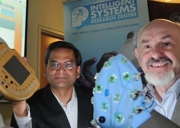 Dr. Girijesh Prasad who is a reader at the University of Ulster's School of Computing and Intelligent Systems at Magee and Professor Martin McGinnity Director of the Intelligent Systems Research Centre pictured at the 'Fusion of Brain-Computer Interface and Assistive Robotics' Workshop at the ISRC. PIcture Martin McKeown. Inpresspics.com.