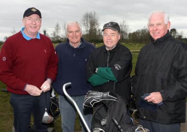 Ian Rosborough (President), Reg McDowell, Bill Hawthorne and George Reid about to tee of at Galgorm Castle Golf Club. INBT19-232AC
