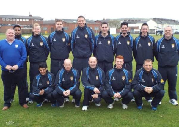 Coleraine 1st XI pictured in their new tracksuits sponsored by "Gareths" with Cricket Club Chairman Gareth Godfrey