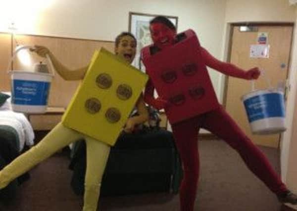 Emma-Jayne Earls and Lynn Richardson doing their bit for charity dressed as giant Lego