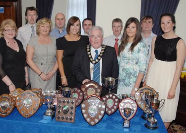 Ballymena Mayor PJ McAvoy joins the Ballymena Hockey Club committee for a photograph in the Adair Arms Hotel on Saturday evening for the annual dinne/prize night. INBT 18-976H