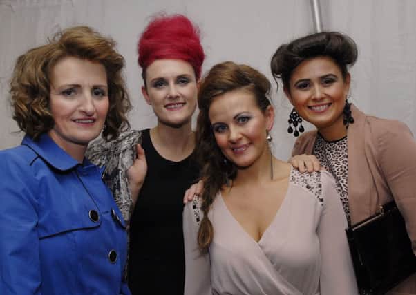 Modelling at the fashion show held in the White Horse hotel on Friday night by Priorians Hockey Club were, from left, Lesley Buchanan, Kristel Brown, Rhonda Duddy and Bronagh Doherty. INLS3912-163KM