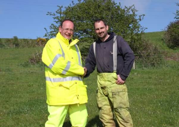 Civil engineer Richard Elliott (left) and contractor Graeme Barr look forward to getting the well site underway for Islandmagee Storage Ltd. INLT 20-675-CON