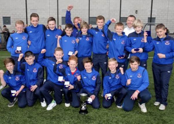 The Ballymena United U-13 team with their cup after winning the U-13 B National League. INBT20-200AC