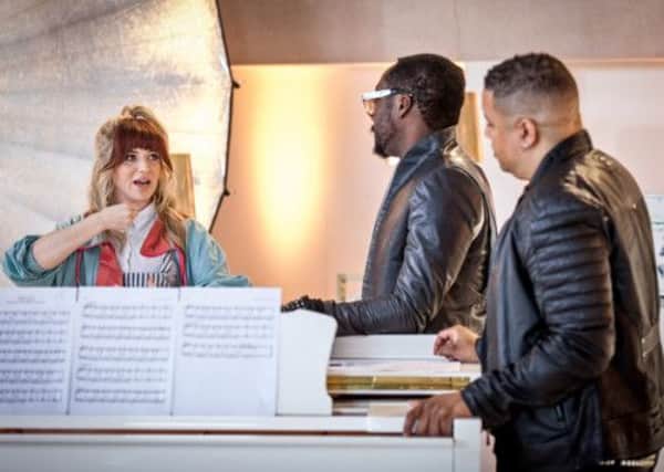 Leah McFall gets some performance tips from coaches will.i.am and Dante Santiago ahead of her big sing-off on The Voice. Pic by BBC/Wall to Wall