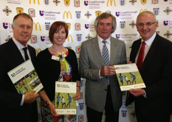Sandra with Northern Ireland legend Pat Jennings and England World Cup hero Sir Geoff Hurst.