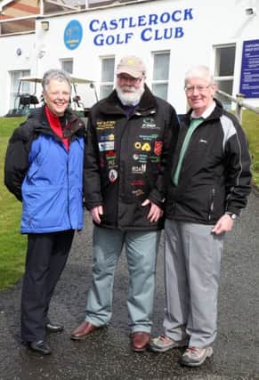 Davy Boyle MBE (The Caring Caretaker) pictured with Pat Hunter and John McClure who helped Davy during his fundraising charity golf day at Castlerock Golf Club on Friday. CR19-418PL