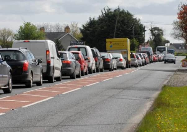 Heavy traffic built up on the main Lisburn Road near Moira on the first day of the Balmoral Show. INUS2012-TRAFFIC