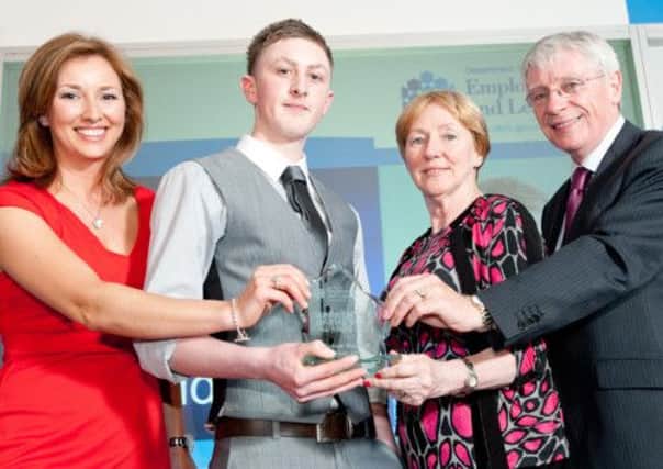 Pictured at the annual Apprentice of the Year Awards at the Holiday Inn in Belfast are Department for Employment and Learning Permanent Secretary Alan Shannon, TV presenter Claire McCollum, Helen Brady from category sponsor City & Guilds and Apprentice of the Year finalist Robert Waddell from Kells.  Robert, a 20 year old engineering apprentice, trains at Northern Regional College in Ballymena and is employed by Dale Farm Limited in Ballymena.
