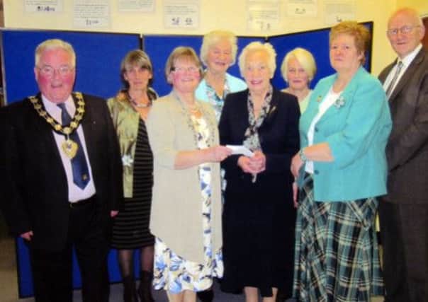 Pictured at the Slemish Area WI Spring Meeting are (from left) Ballymena Mayor, Ald. PJ McAvoy, Rosli Stevenson (Gracehill & Galgorm), Marion Gregg (Slemish Area Chairman and Glarryford WI), Eileen Mol (Broughshane WI), Elizabeth Montgomery MBE (Carrickmannon MRI Support Fund), Jenny Carlton (Cullybackey WI), Ethel Simpson (Slemish Area Executive Member and Carnlough WI), Robert Young (acting headmaster of Cullybackey High School).