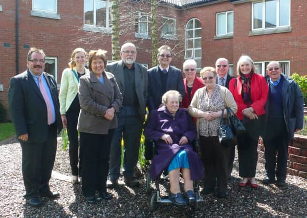 Cllr John Scott (left) with members of the Wilson and Creighton families at the official opening of the memorial garden.
