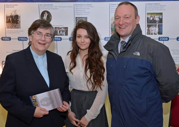 Ballycarry Presbyterian Church minister,Rev Gabrielle Farquhar is pictured with Sophie Nicholson and minister of Gardenmore Presbyterian Church Rev Gary Glasgow at the launch of the booklet Memories- Fresh and Old. INLT 20-022-PSB