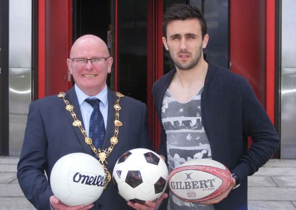 Northern Ireland International Daniel Lafferty with Mayor of Derry, Colr. Kevin Campbell endorsing tomorrow evenings Together Through Sport event.