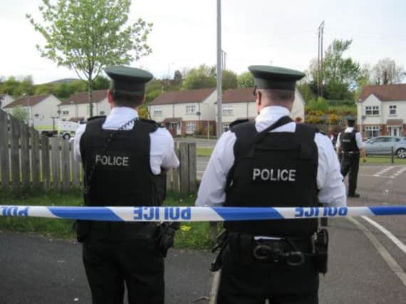 BEST QUALITY AVAILABLE

Police man the cordon at Foxes Glen in west Belfast where a suspected bomb has been found this afternoon. PRESS ASSOCIATION Photo. Picture date: Friday May 17, 2013. See PA story ULSTER Shots. Photo credit should read: Lesley-Anne McKeown/PA Wire
