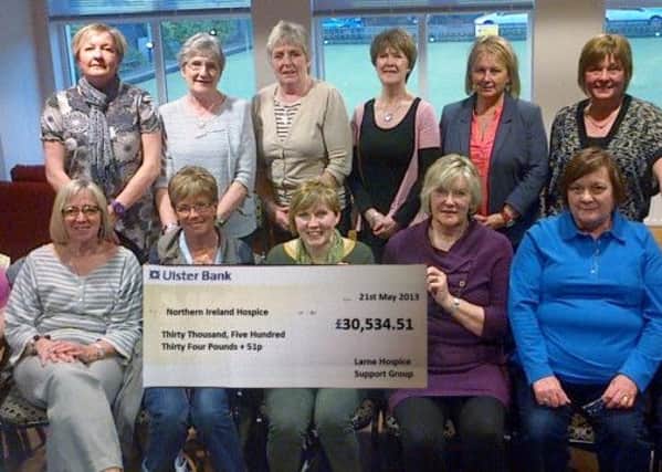 Members of Larne Hospice Support Group handing over a cheque for the fabulous sum of  £30,534.51. INLT 22-600-CON