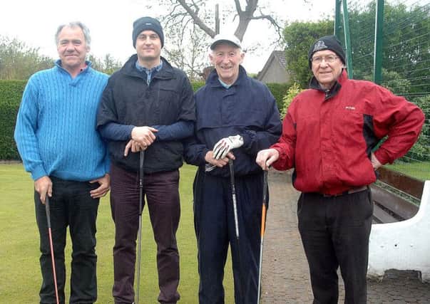 Davy Chambers, Peter McCann, Fred Johnston and Gerry McCann braved the wet conditions at Ballymena Golf Club. INBT 21-854H