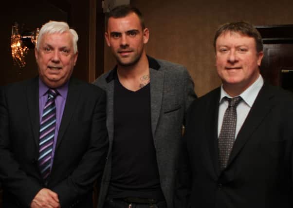 Everton midfielder Darron Gibson with Michael Hutton and Phillip O'Doherty at the launch of the Hughes Insurance Foyle Cup.