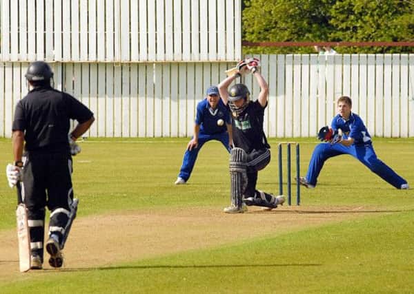 A Ballymena batsman lets a delivery pass through to the wicketkeeper during Saturday's Ulster Bank Senior Cup tie against Muckamore at Moylena. INBT 22-916H
