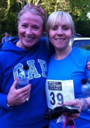 County Antrim Harriers Kim Gleave and Lisa Barrett pictured after successfully completing the Runher 10k race on Friday evening at Holywood. INLT 22-512-CON