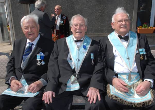 The Worshipful Master of St John's Masonic Lodge No 162, Islandmagee, pictured at the 200th anniversary celebrations with Jack Leahy who received his 65 year bar and James N Brown who received his 60th bar. INLT 22-402-PR