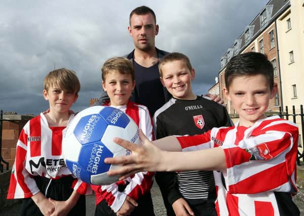 Everton midfielder Darron Gibson returned to his native Derry to launch the Hughes Insurance Foyle Cup 2013. Included with Darron on the City's Historic Walls are local Derry and District Youth players Adam Carr, Ciaran McLaughlin, David Arthur and Caoimhin O'Neill who will emulate the Premiership star by competing in this year's competition.
Photo Lorcan Doherty Photography