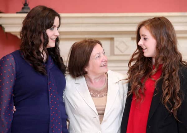Laura Cushley (left) & Paula McMenamin (right) pictured with Laureate, Mairead Maguire, at the first day of the Nobel Women's Initiative Conference "Beyond Militansm and War". Young women from Friends School Lisburn have been working as volunteers this week giving a chance to meet the Laureates and other peace activists. Picture John Murphy Aurora PA. Press Release to follow.