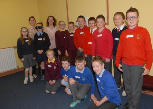 At the Be Safe event held at Banbridge Parish Centre are pupils from local primary Schools along with Lucinda Love Teggarty and Debbie McCague from REACT. INBL2313-BESAFE