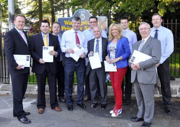 Waringstown Ulster Unionist branch members launch their petition in opposition to the Conflict Resolution Centre at the Maze site, with help from Tom Elliott, party justine spokesperson and MLA's Sam Gardiner and Jo-Anne Dobson and Cllr Colin McCusker. INLM22-107gc