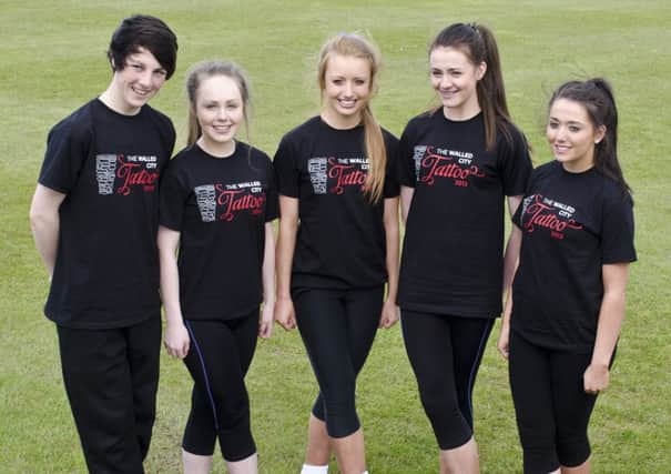 Irish dancer Niamh Murray from Lisburn (middle) with fellow Walled City Tattoo dancers