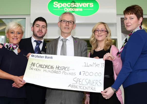 Newtownabbey opticians raises over £700 in aid of Childrens Hospice. STAFF from Specsavers in Newtownabbey laced up their trainers to successfully compete in the Deep RiverRock Belfast City Marathon, raising vital funds for the Northern Ireland Childrens Hospice. Newtownabbey Specsavers store director, Tony McGinn, ran the full 26.2 miles of the marathon route, whilst Specsavers staff members, Samuel Burns, Maggie Crangle, Antoin Rooney, Angela Tormey, and Joanne Toner all participated in various relay sections. A total of 29 Specsavers staff members from seven different stores across the province ran in this years event. Pictured from left at the cheque hand over was, Maggie Crangle, Samuel Burns, Tony McGinn, Diane Weston (NI Childrens Hospice) and Angela Tormey. INNT 24-012-FP