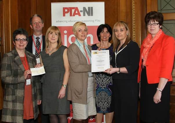 Representatives of St Joseph's PTA in Lisburn pictured with their award presented by MLA Michelle McIlveen at a special ceremony at Parliament Buildings.