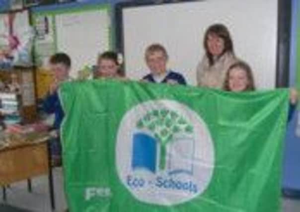 St Marys Primary School, Derrytrasna, is a shortlisted finalist in the Airtricity and Eco-Schools Global Wind Awards. Included in the picture are Ruth Van Ry Eco-Schools Project Officer and the pupil led Eco Committee. INLM23-016