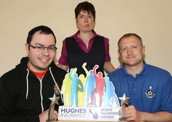Local man John Clarke has won the Hughes Insurance Ballymena Sports Volunteer Award for his work with Waveney Youth Football Club and Ballymena Community Sport Forum. He is pictured with Ballymena Hughes Insurance Branch Manager Sylvia Thompson and Johnny McClenaghan from Ballymoney Blaze Volleyball Club, who won the Young Sports Volunteer of the Year Award.