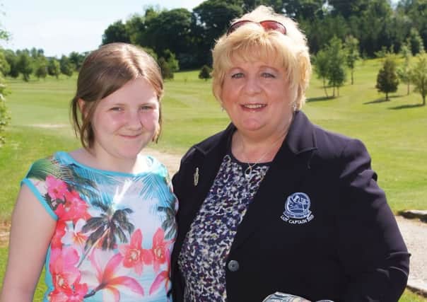 Eileen Robb, Lady Captain, pictured with Lauren King during her Lady Captain's Day at Faughan Valley Golf Club on Saturday. INLS2413-188KM