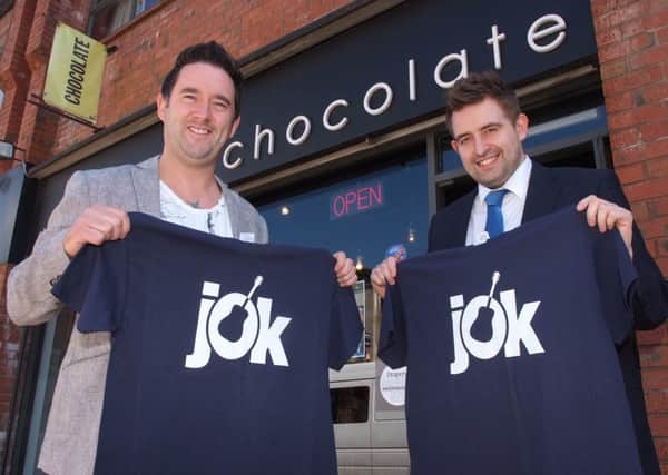 Barry Conaghan, left, of Chocolate, Foyle Street, and Aaron McElhinney, pictured with the Jordan O'Keefe t-shirts which are selling like hot-cakes. INLS2413-105KM