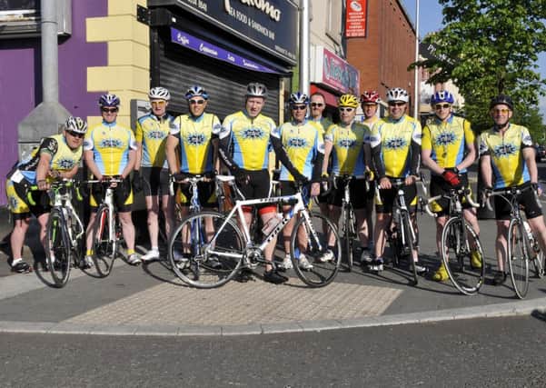 Graeme Cousins with the members of Apollo Cycling Club. INLM22-104gc