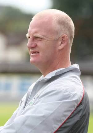 Former Northern Ireland striker Iain Dowie will hold a coaching session in Ballymena this Saturday.