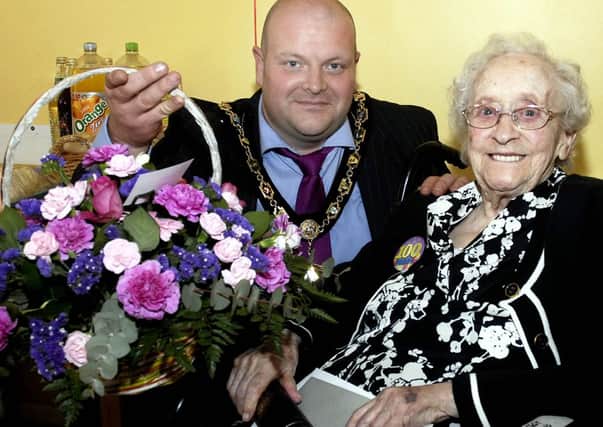 Mrs Lottie Laverty who celebrated her 100th birthday on Monday pictured with Mayor of Craigavon, Councillor Mark Baxter. INPT24-207.