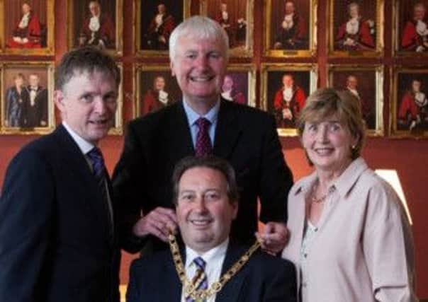 Incoming Mayor of Coleraine, Councillor David Harding (UUP) pictured here with outgoing Mayor, Councillor Sam Cole (DUP) as he hands over the Mayoral chain, along with incoming Deputy Mayor, Councillor Mark Fielding (DUP) and outgoing Deputy Mayor, Alderman Maura Hickey (SDLP).
