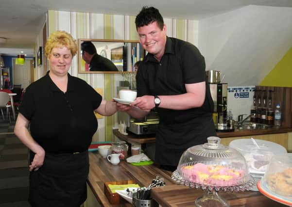 Service with a smile at Superstars Coffee Dock from trainee's Aidan Campbell and Karen Stewart.INMM2413-316SR