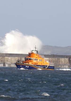 Holyhead breakwater during high seas. Six people died with the foundering of the MV Swanland in November 27, 2011. 
A mayday call was sent out from the ship at around 2am from 20-miles north-west of the Llyn peninsula in north Wales after the hull cracked.