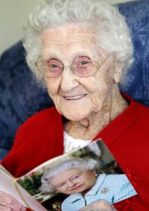 Ruby Ringland reads her telegram from the Queen as she prepares to celebrate her 100th birthday on Thursday. Picture: Cliff Donaldson
