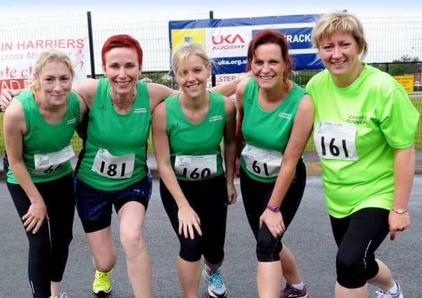 Under starters orders...members of the Carmen, Carrickmore who took part in the Stunnerz 'IN' Runnerz Five Mile Walk/Jog/Race in Magherafelt. INMM2613-121ar.