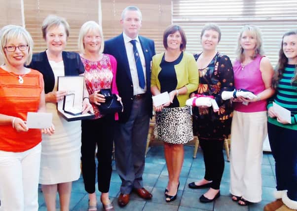 Cairndhu club captain, Alex Maguire with prizewinners in his ladies' competition. INLT 25-634-CON