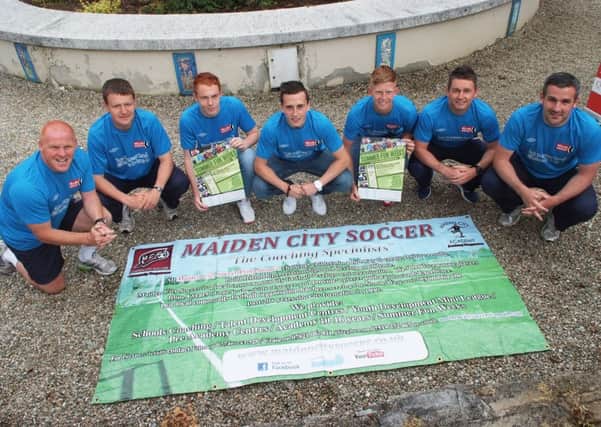 Pictured at the launch of the Summer Fun Weeks 2013 by the Maiden City Soccer Academy at St. Columb's Park House were, from left, John Cunningham, Craig Lynch, coaches, Kristin Gibson, Glasgow Rangers FC, Aaron McEneff, Tottenham Hotspur FC, Mehawl Martin, Charlton Athletic FC, Ryan Semple and Stephen Parkhouse, coaches. INLS2513-156KM