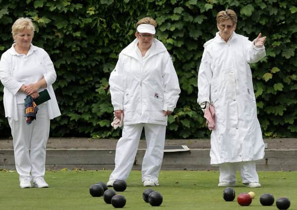 Guiding the bowls in during Thursday's match between Lurgan and Ward Park. Picture: Cliff Donaldson